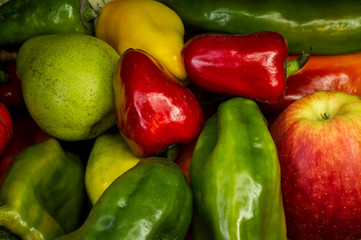 food for healthy people. Multicolored vegetables. Green and red pepper, apple, pear