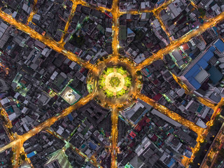 Aerial view Road roundabout, Expressway with car lots in the city in Thailand.beautiful Street , downtown,cityscape,Top view. Background,Aerial view city scape