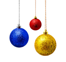Hanging red blue and yellow christmas ball isolated on a white