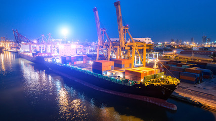 Naklejka premium container,container ship in import export and business logistic,By crane,Trade Port , Shipping,cargo to harbor.Aerial view,Water transport,International,Shell Marine,transportation,logistic,trade,port