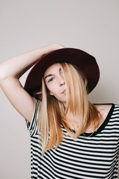 Young stylish woman wearing a hat