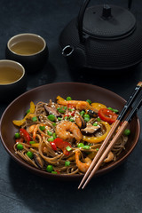 Asian lunch. Buckwheat noodles with seafood and vegetables