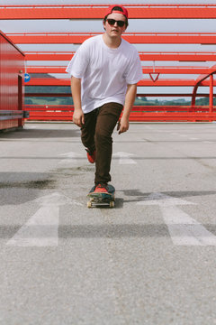 teenager skating against the driving direction