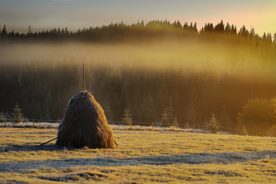 haystack in mountain rural area
