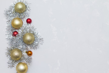 Fototapeta na wymiar gold red Christmas balls tinsel glitter new year Christmas celebration background