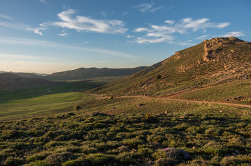 Moss covered highland valley in Middle Atlas mountain range in sunset, Morocco, Africa