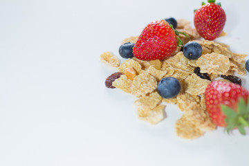 whole grain cereal flakes which mixed berry fruit and raisins