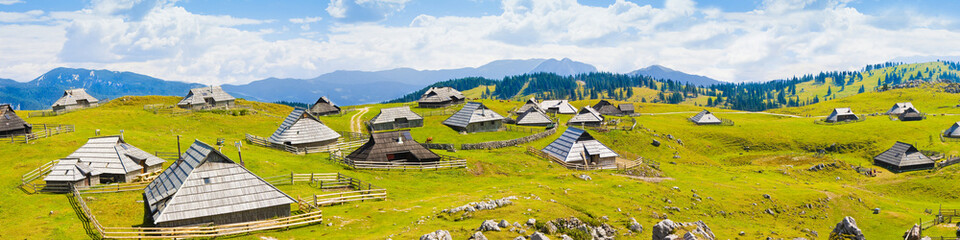 "Velika Planina", which in Slovenian means "great plateau" is one of the most important Slovenian highlands with a particular architecture of wooden huts and barns