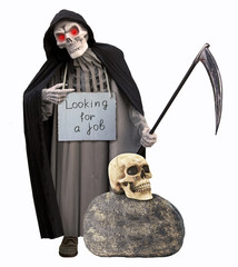 The grim reaper is looking for a job. A skull is on a stone.