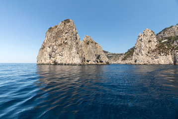 Faraglioni Rocks on Capri Island, Italy. Rock's names left to left: Stella, Mezzo and Scopolo or Fuori