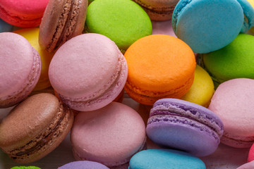 Traditional colorful french macarons are sweet meringue-based confection.