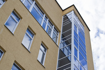 Residential high-rise buildings, residential construction in Russia, plastic windows, glazed