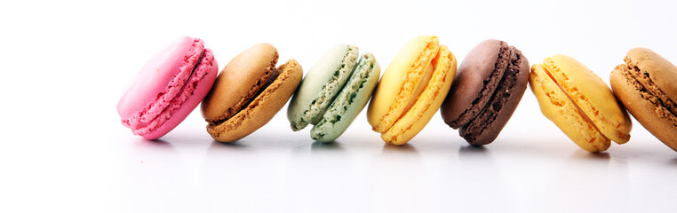 Sweet and colourful french macaroons or macaron on white background, Dessert