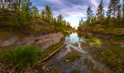 Low tide. The dried up duct. Wild nature. Nature of the north. Karelia Russia.