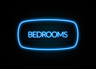 Bedrooms  - colorful Neon Sign on brickwall
