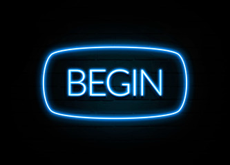 Begin  - colorful Neon Sign on brickwall