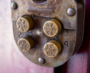 Fragment of a mechanical combination lock with rotary controls