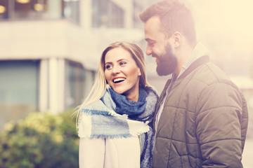 Young couple hugging in the city