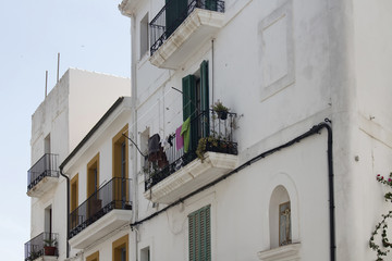 Fototapeta na wymiar View of old, typical buildings in Ibiza. It is one of the Balearic islands, an archipelago of Spain in the Mediterranean Sea.