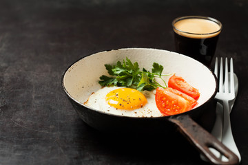 Sunny side up egg in cast iron pan