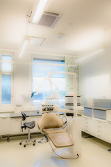 Modern Dentist Office, Dental Hygiene, Dentist's Chair. soft focus, blurred