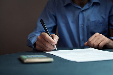 Businessman signing contract.