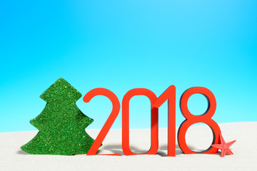 Happy new year concept. 2018 sign with toy tree