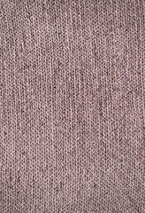 Real knitted fabric or wool background texture
