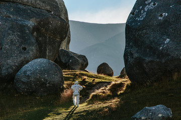 An astronaut bravely explores the unknown abyss