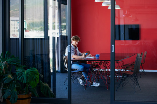 Business Startup Company Worker in the boardroom using smart phone