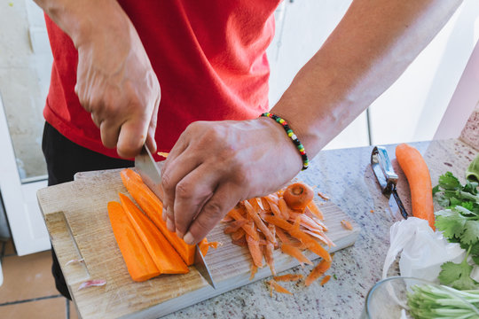 Man Cooking, Cut Carrot Julienne Style