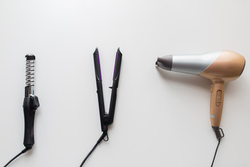 hairdryer, hot styler and curling iron or tongs