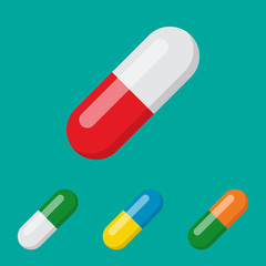 Set of different color pills in flat lay design. Collection of capsule or vitamin icons.