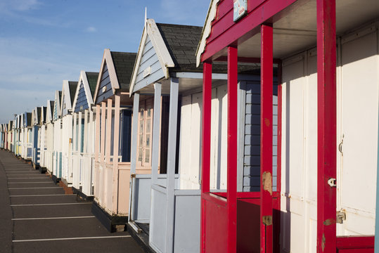 Row of brightly coloured beach huts