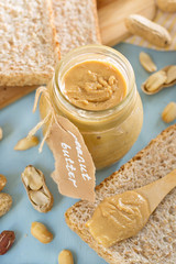 Homemade peanut butter from roasted peanuts in jar
