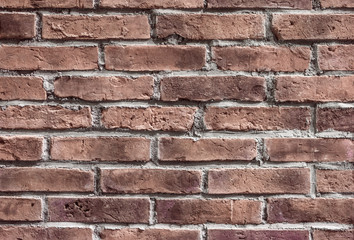 Brown brick texture with scratches and cracks