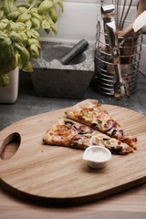 Tasty pizza in the kitchen