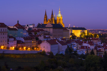 Obraz premium Prague castle complex with st Vitus cathedral at evening. Traditional view on the Prague castle illuminated by lights.Prague. Hradcany. Czech Republic