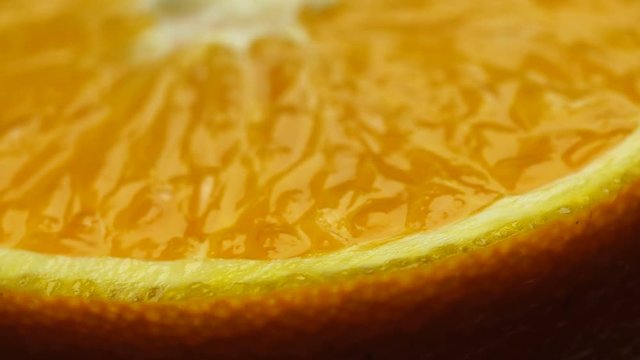 Dolly shot of orange halves, macro video
