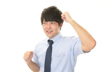 ガッツポーズのビジネスマン