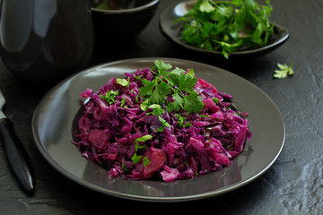 Salad of red cabbage stew with apples, a dish of a New Year's table.