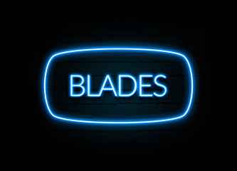 Blades  - colorful Neon Sign on brickwall