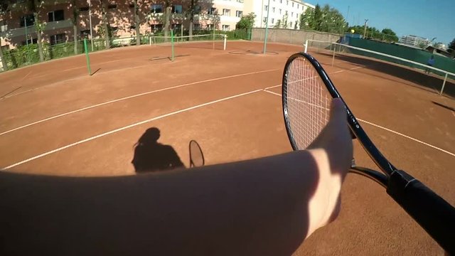 Point of view of two women compete in tennis match