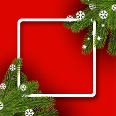 Red winter background with spruce branches.