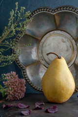 Yellow pear on black background