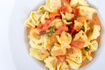 tortellinis pasta in tomato sauce