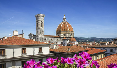 Fototapeta na wymiar Dome of cathedral church Santa Maria del Fiore close up at spring day, Florence, Italy, retro toned