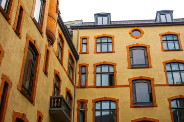 Fototapeta premium old industrial brown houses in a backyard