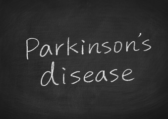 parkinson's disease concept words on a blackboard background