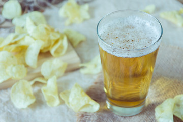 Beer and chips on the table. Octoberfest theme
